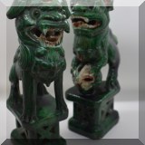 P15. Pair of green porcelain foo dogs. 9.5&rdquo;h 
